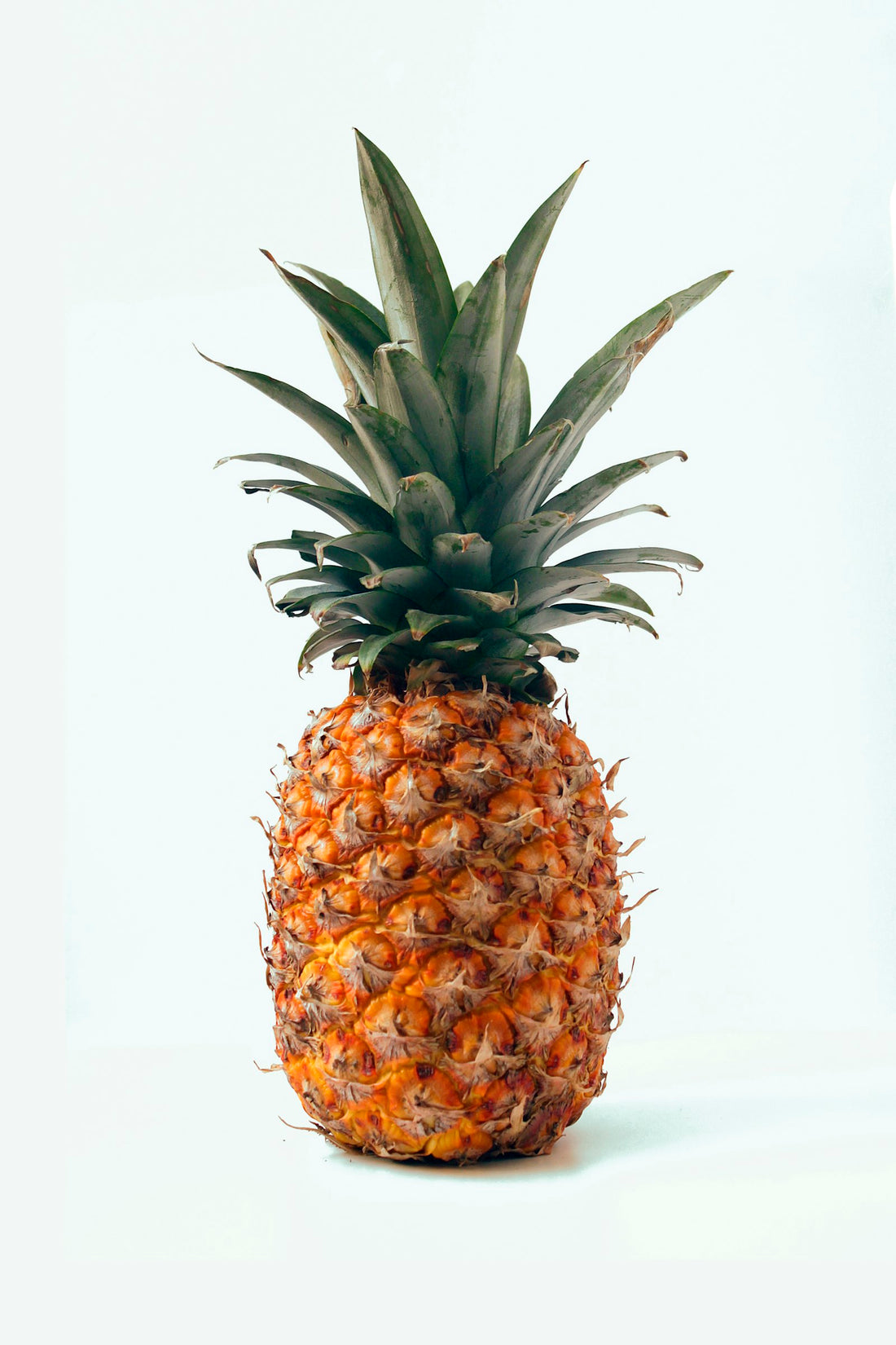 Fresh pineapple for bromelain vs papain fruit-enzyme comparison — Men's Health