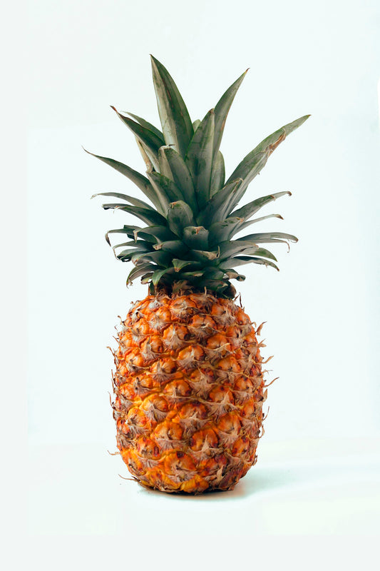Fresh pineapple for bromelain vs papain fruit-enzyme comparison — Men's Health